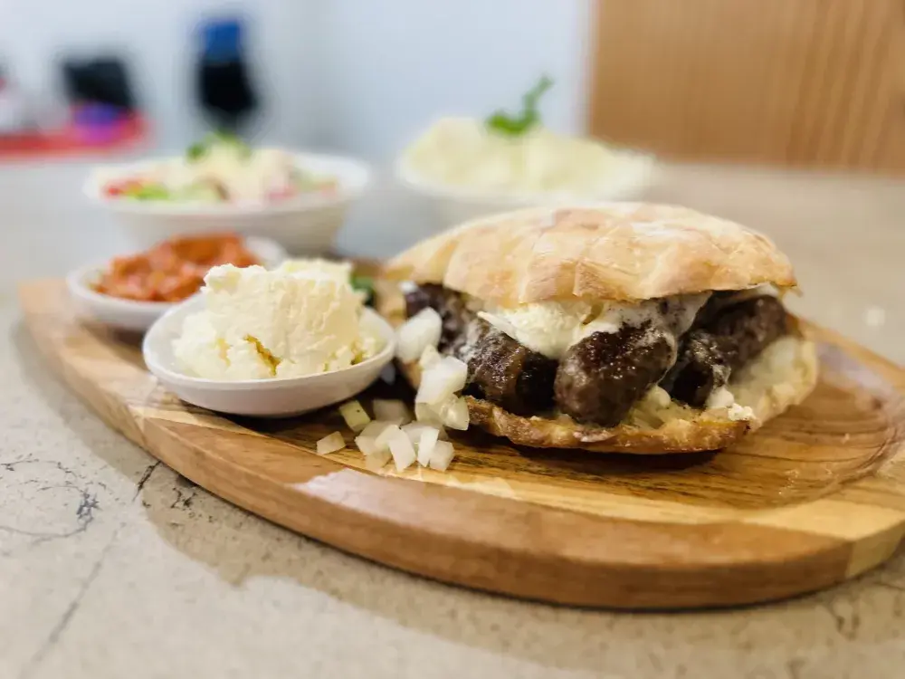 Traditional Serbian dish served with kajmak and ajvar